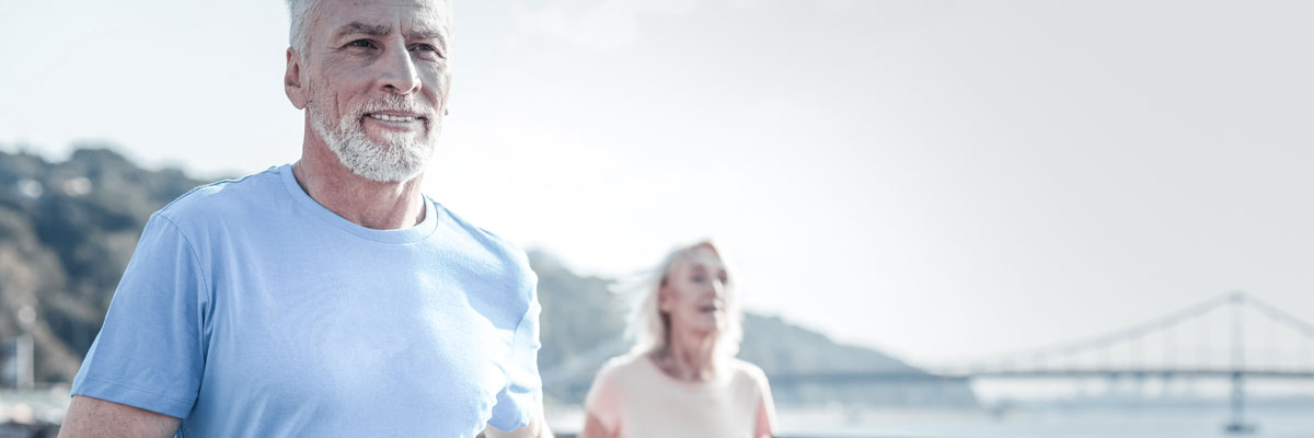 Older couple jogging
